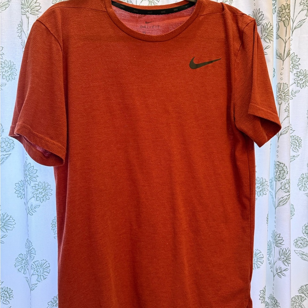 Nike Short Sleeve Dri-FIT Tee in Rust Orange with Black Swoosh